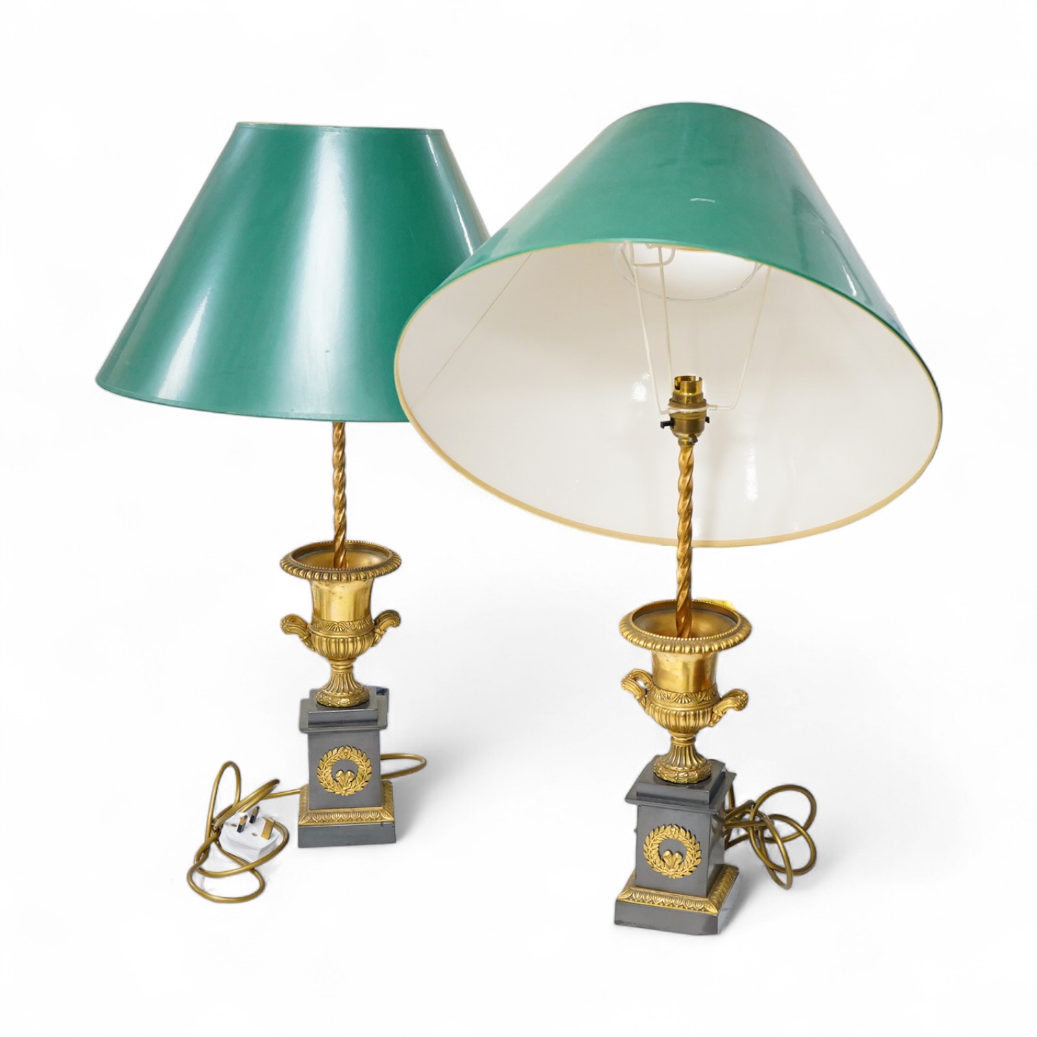 A pair of Empire style lamps with green shades